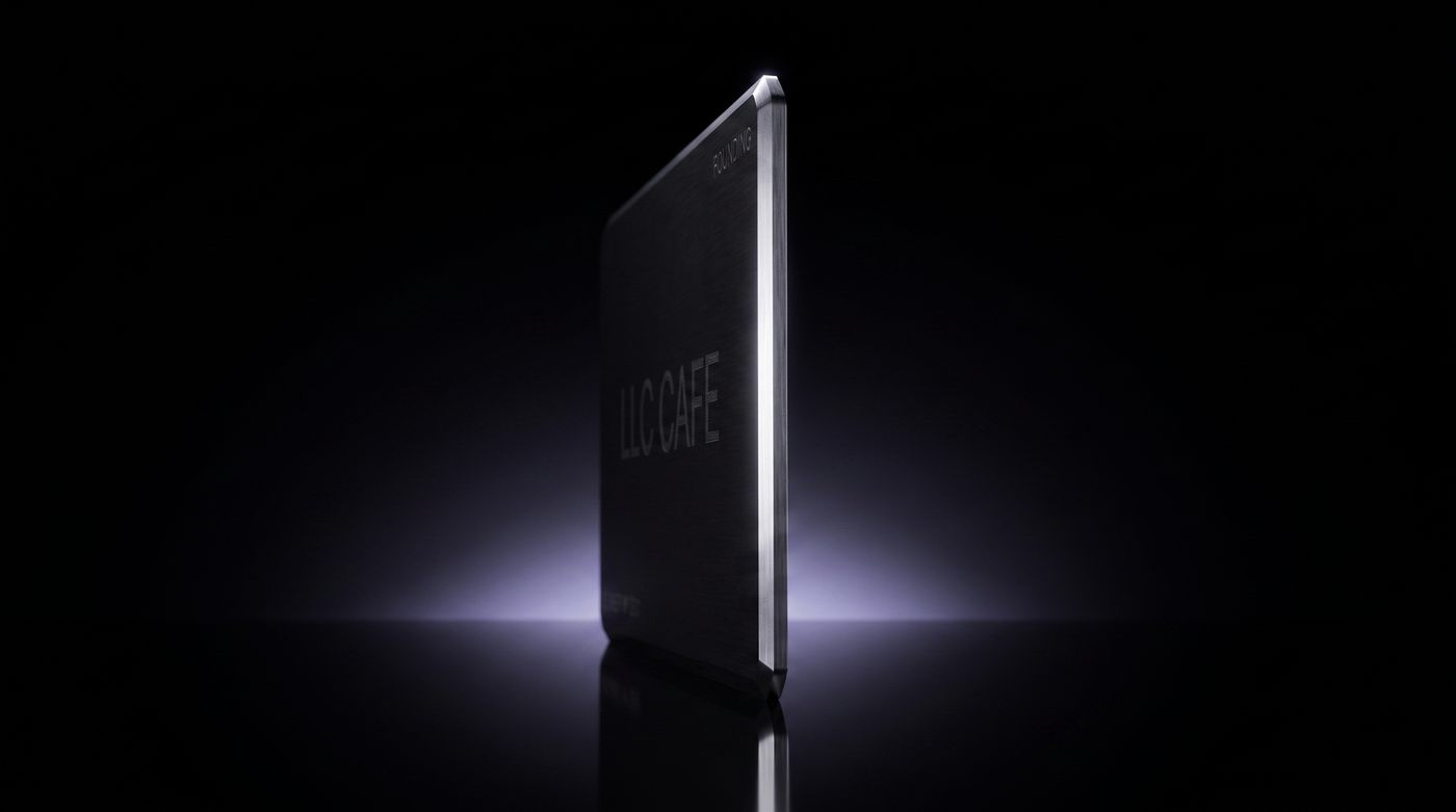 The card standing on edge in darkness